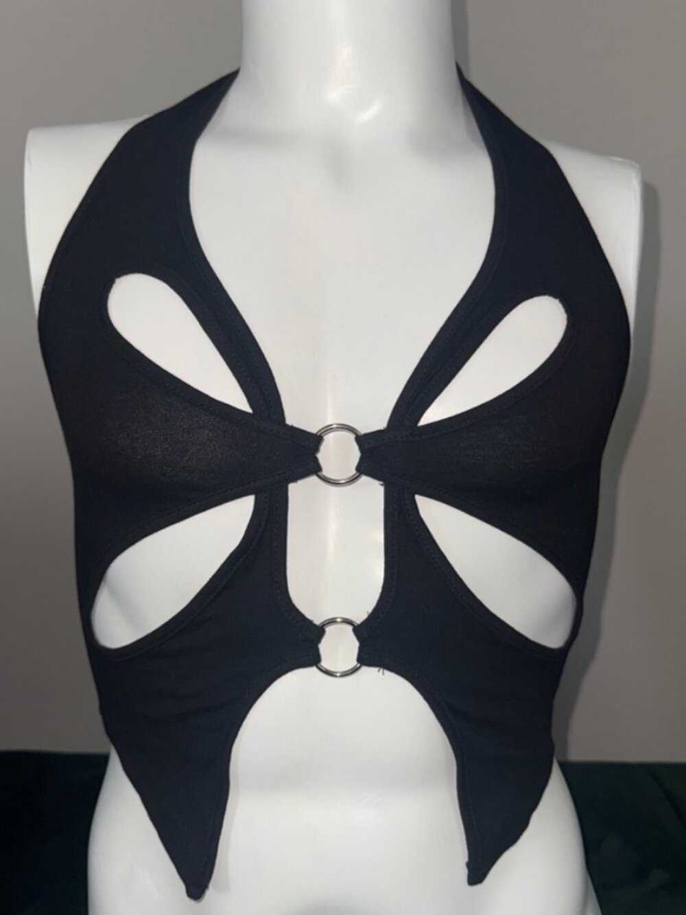 Black cut-out halter top with silver rings